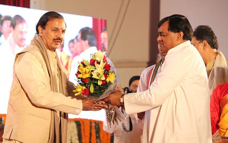 01-Dr. Mahesh Sharma flowers.jpg